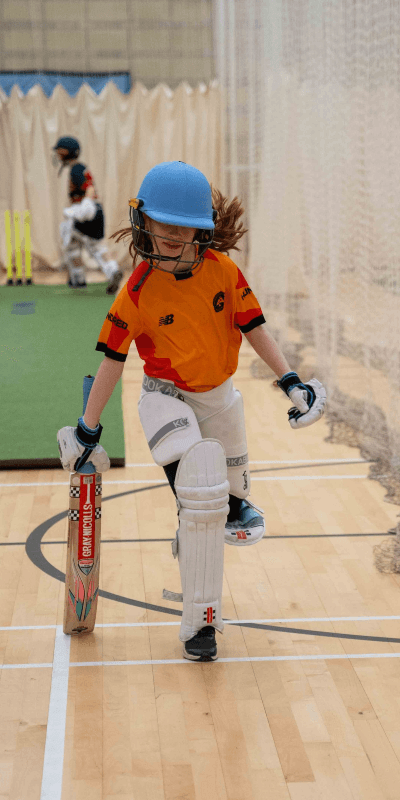 A Child Playing Cricket